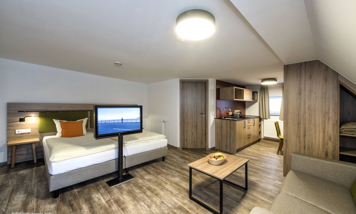 Nordwestliche Außenstadt Hotel | Übernachten in der Tenne