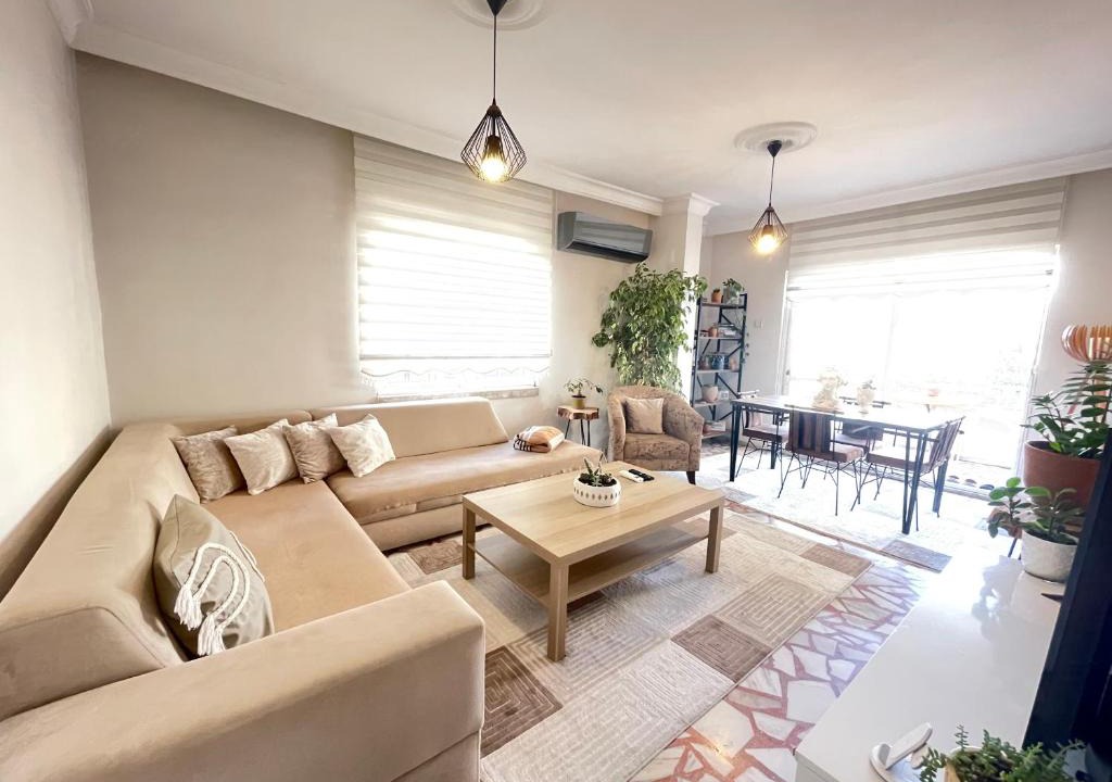 Palmiye Mahallesi Apartment | Şehrin kalbindeki deniz manzaralı 3+1 ev