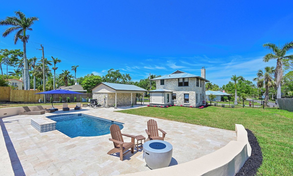 River District House | 100 yr old Stone House with a heated pool 9 mi to beaches & 2 mi to downtown