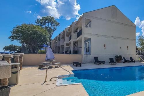 Pass Christian House | 123 Beau Clair - Beachside Townhome with Balcony and Pool in Long Beach