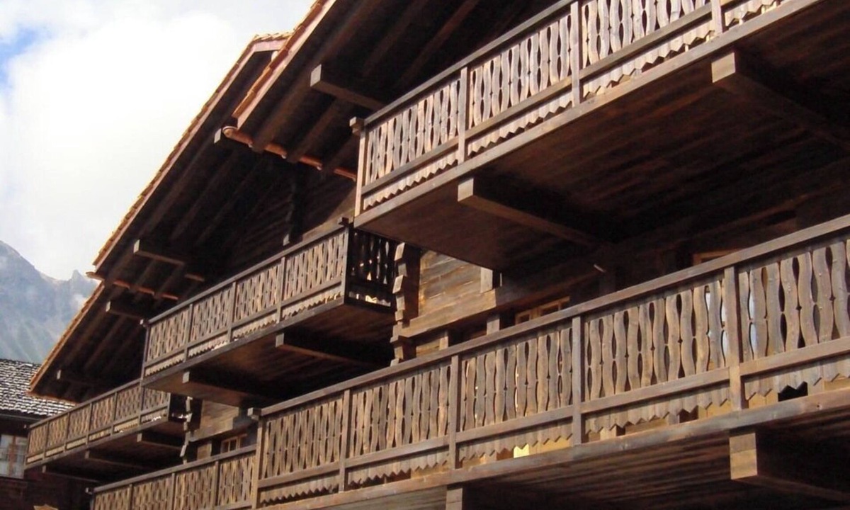 Grimentz Apartment | 2 storey apartment with 4 bedrooms and sauna for 9 persons : living room with woodstove - kitchen wi