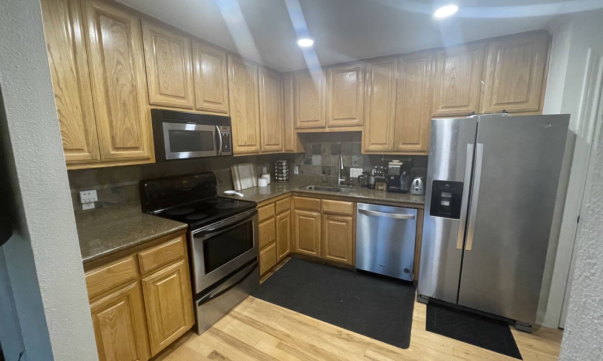 North Shoal Creek Condo | 2000 sq ft two story 2 bedroom 1 bath condo w/ fenced patio