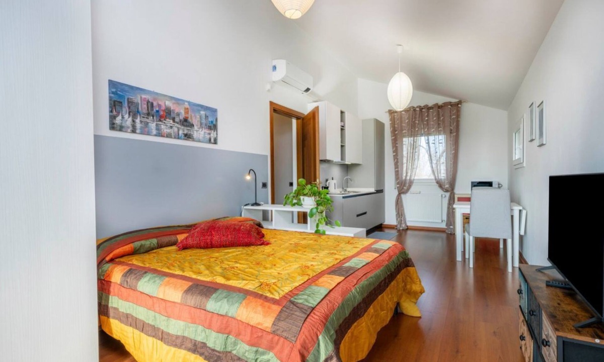 Udine House | A comfortable and bright 40 sq m studio apartment, perfect for two people, located on the first floor of a small villa (no elevator).The property is located in an extremely quiet area surrounded by greenery, with a cycle path nearby. Guests can easily re