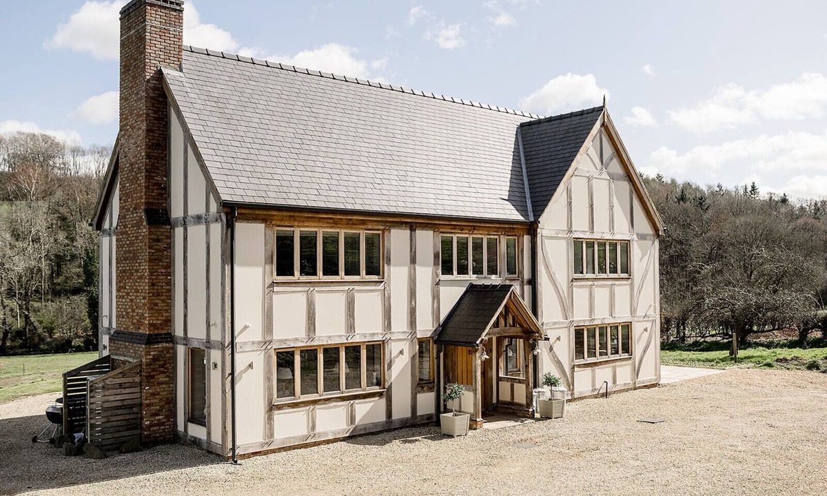 Acrefair House | A luxurious riverside cottage with stunning views, a hot tub, and fishing access.