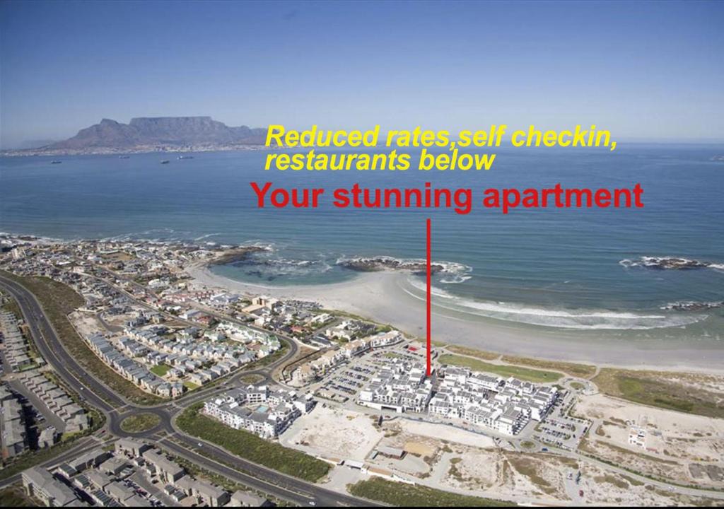Big Bay Apartment | A Modern unit, self checkin, restaurants and shops below