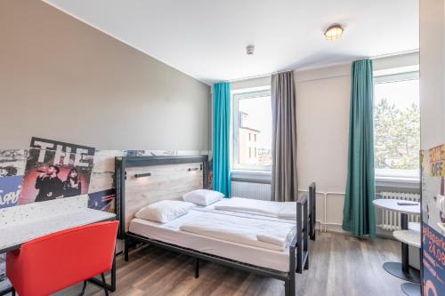 St. Ulrich Hotel | a&o München Laim