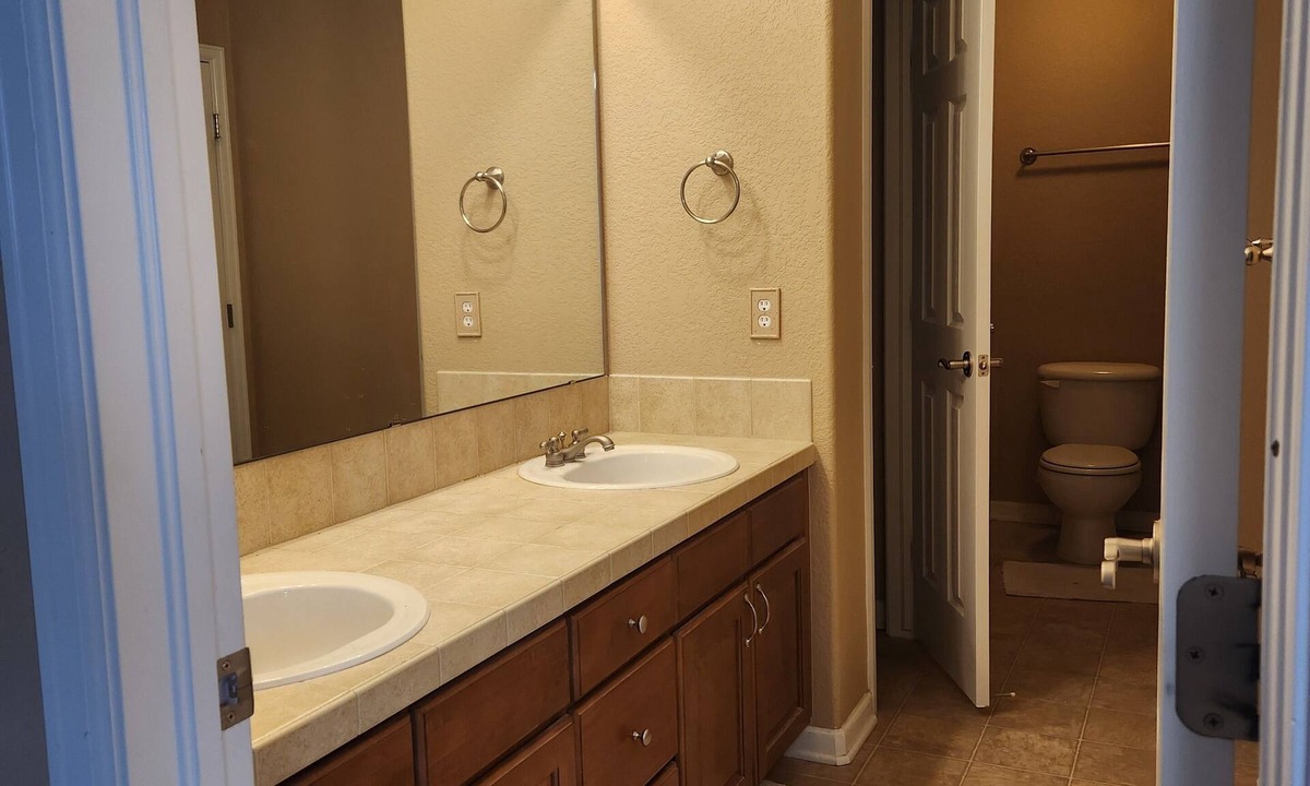 Aurora House | A private bedroom with a private bathroom