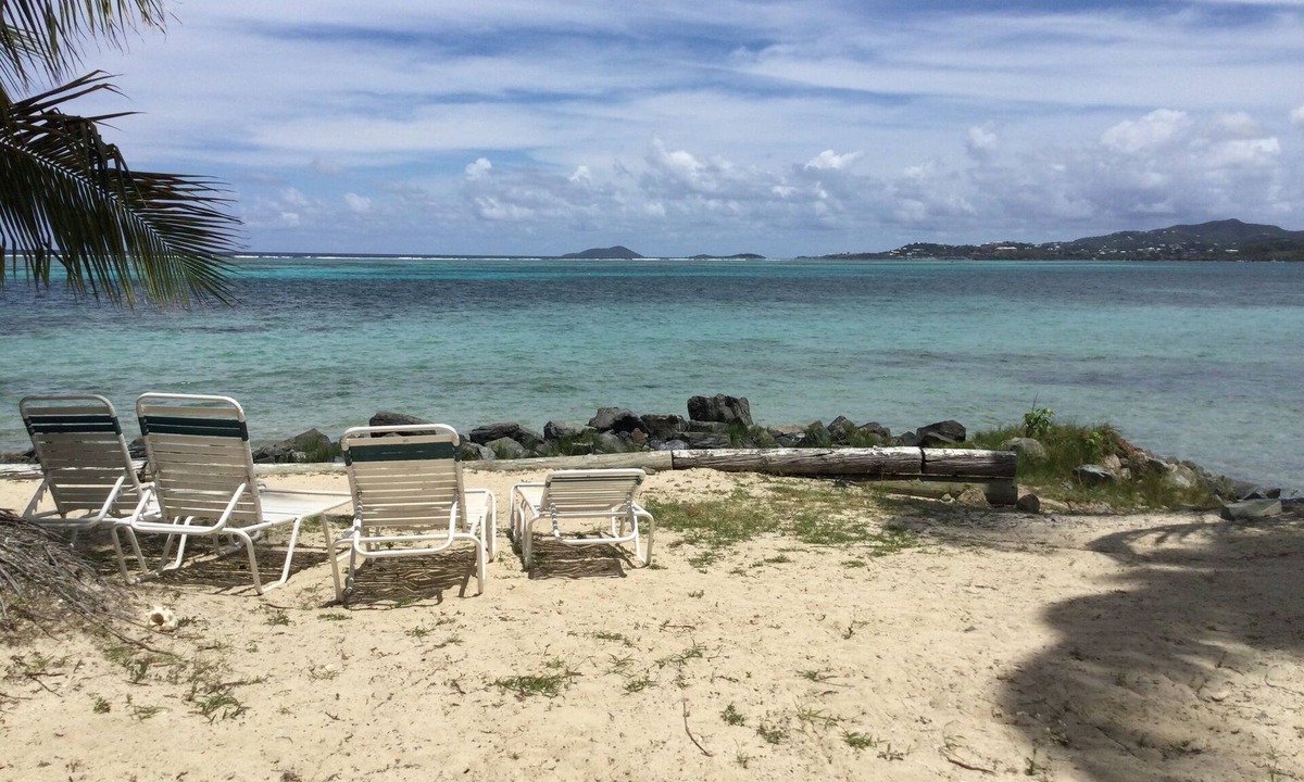 Estate Golden Rock Condo | A Tropical Paradise Inside and Out, right on the Beach!