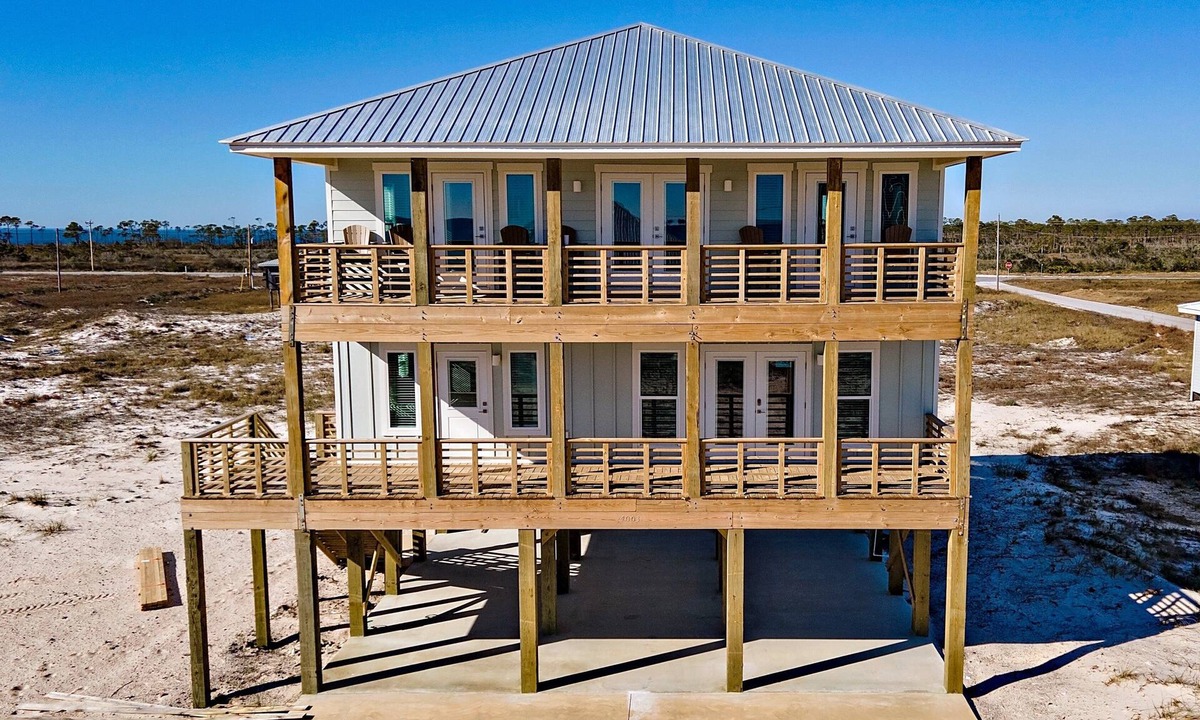 Southpointe House | A Wava Sunshine big 5-bedroom beach view home with pool steps to the beach by Prickett Properties