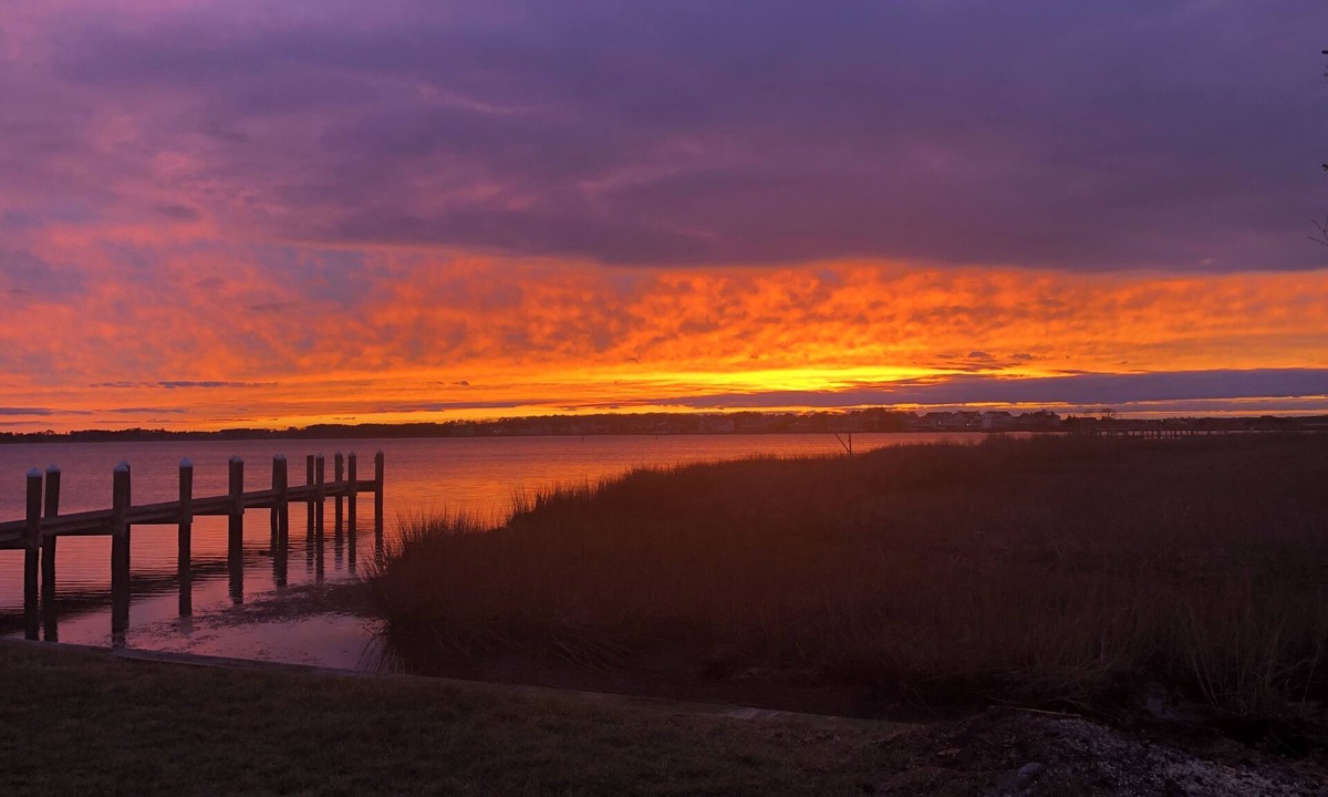 Bethany Beach House | Activities included up to $300 FREE PER WEEK! FREE DAILY ACTIVITIES! Waterfront location with bright and beachy decor this vacation townhome boasts incredible views from every level! Located in North Bethany close to the Indian River Inlet and ma