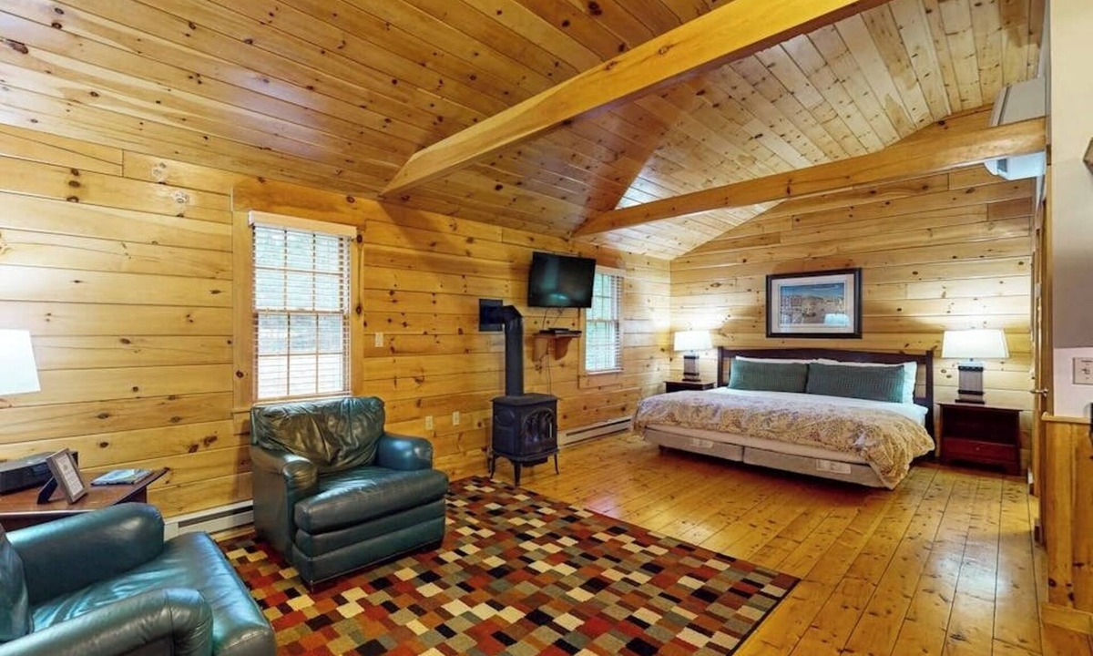 Northport House | Adventure ready studio cabin with wooded views, fireplace, & AC