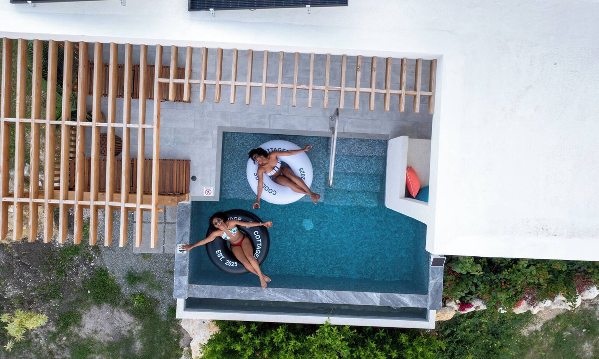 Saint George Parish Cottage | Affordable luxury, with runway views and tropical breeze.