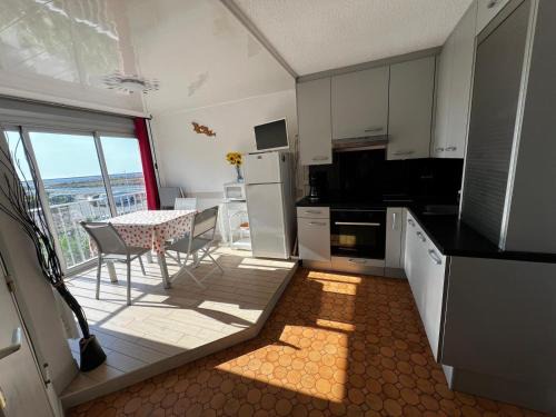 Gruissan Apartment | AIG 59 – Studio avec 2 cabines – Résidence Grand Sud – Gruissan – 4 personnes