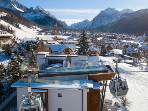 San Vigilio Hotel | Al Plan, A mountain moving hotel