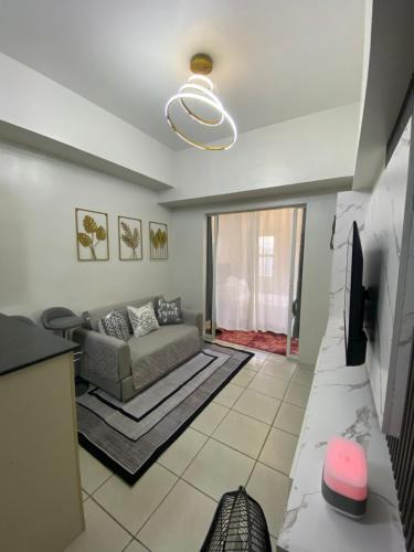 Wack-Wack Greenhills Apartment | AMA Tower Residences - Liam Kyro Staycation Place