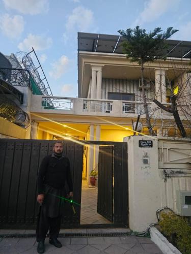 Loralai District House | Ambassador Suites