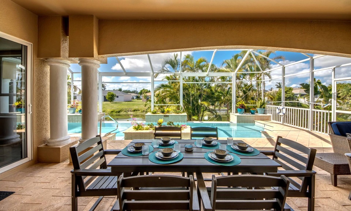 Fort Myers Villa | Ample 3 BR/3 bath waterfront Villa with 2 suites, heated pool, kayaks, pool table, fishing poles