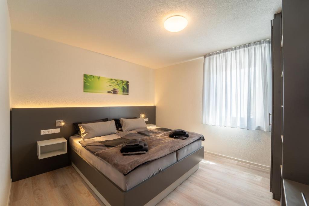 Remseck am Neckar Apartment | Aparthotel Neckartal - Premium Serviced Apartments mit je 1 oder 2 Doppelzimmern - Highspeed-WLAN, 55' Smart-TV in jedem Zimmer, Vollküche, Klima, Parkplatz - 15 Min nach Stuttgart, Ludwigsburg & Waiblingen - die perfekte Basis für Business & Privat!
