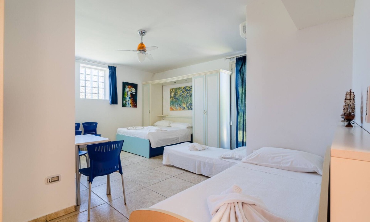 Neviano House | Apartment 'Core Resort - Familiare Bianca' with Shared Pool, Wi-Fi and Air Conditioning