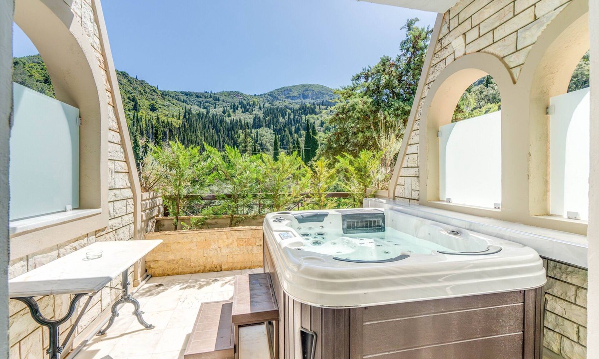Agios Gordios Apartment | Apartment 'Doliva John' with Private Hot Tub, Mountain View, and Air Conditioning