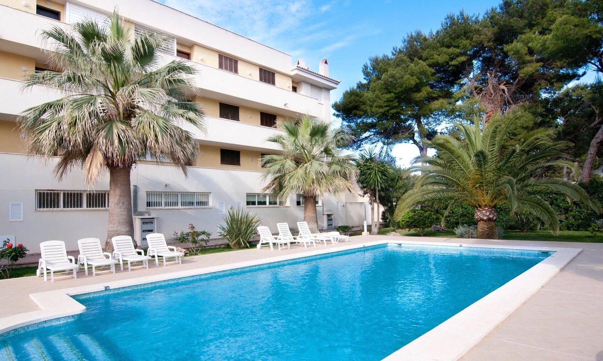 Cala Agulla Apartment | Apartment Drac Blanc 1-4 close to the Beach with Sea View, Pool, Terrace & Wi-Fi