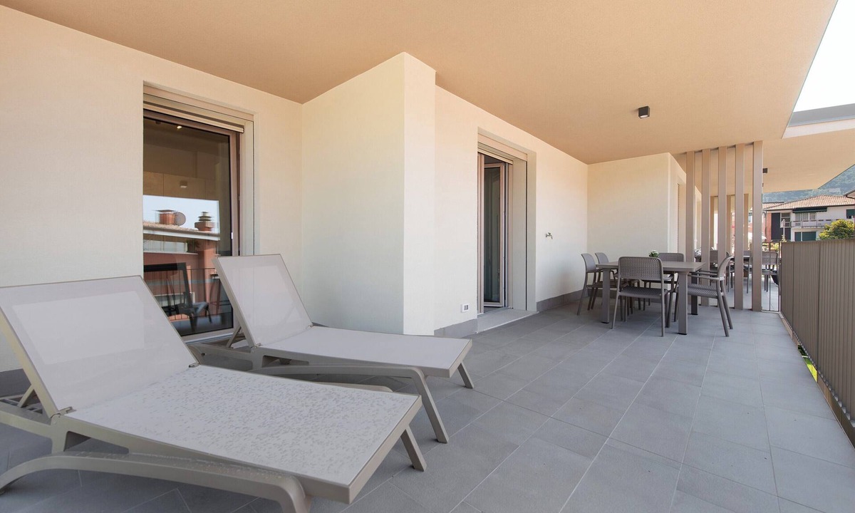 Garda Apartment | Apartment 'Eleonora C3' with Shared Pool, Private Terrace, and Air Conditioning