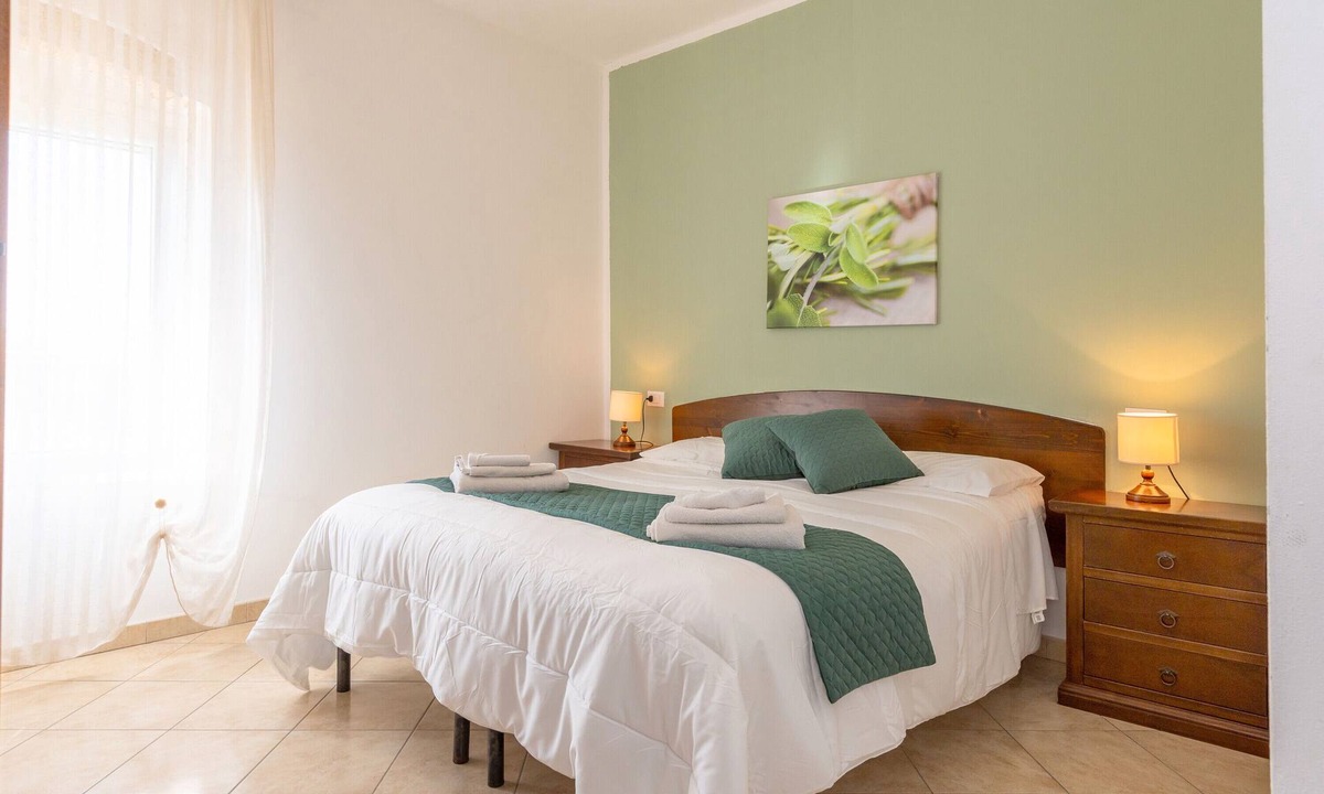 Rosignano Marittimo Apartment | Apartment 'Salvia' with Shared Pool and Garden