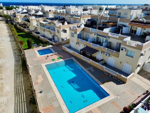 Kapparis Apartment | AquaSol Suite Modern 2BR with Shared Pool