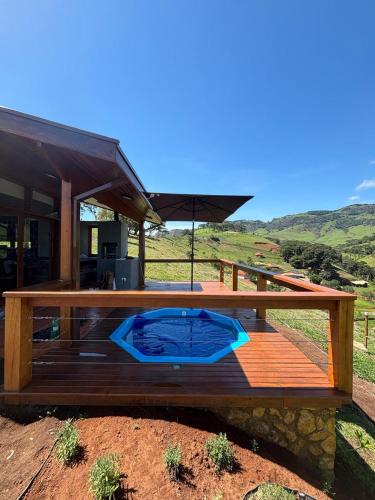 Paraisopolis House | Aura dos Ipês