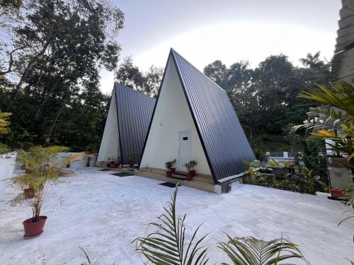 Devikolam House | AURACREST HAVEN A-Frame Cottages and Deluxe Rooms