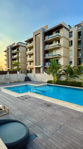 New Cairo Apartment | Azad Compound Luxe with pool