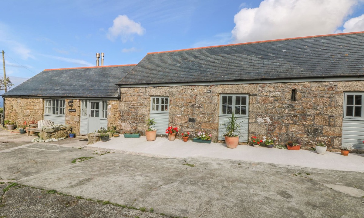 Chysauster Cottage | BACK OF BEYOND, pet friendly, with open fire in St Ives