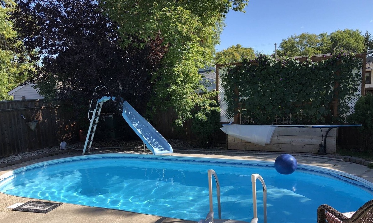St. Vital House | Backyard oasis awaits. Enjoy your stay.