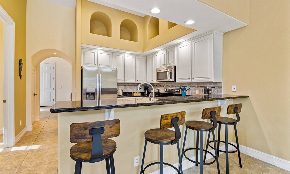 Indian Harbour Beach House | Beach Breezes & Backyard Bliss — Hot Tub, Fire Pit, Shuffleboard & BBQ Fun! 🏖️