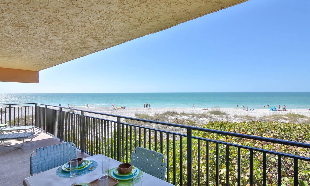 Holmes Beach Condo | Beach Oasis! Beachfront Condo with Unforgettable Sunsets, Heated Pool, WiFi