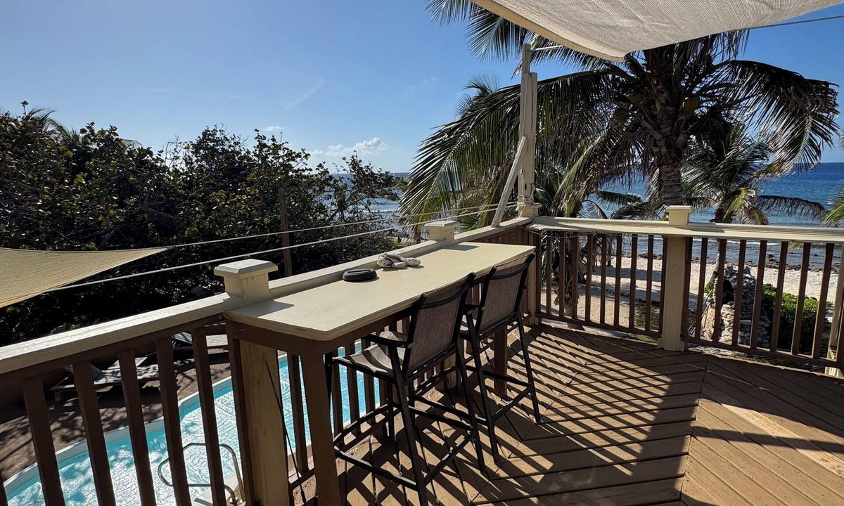 West End Apartment | Beachfront 1-bdr 1-bath "Coconut Palm Suite" 100 ft from the Ocean with a Pool!