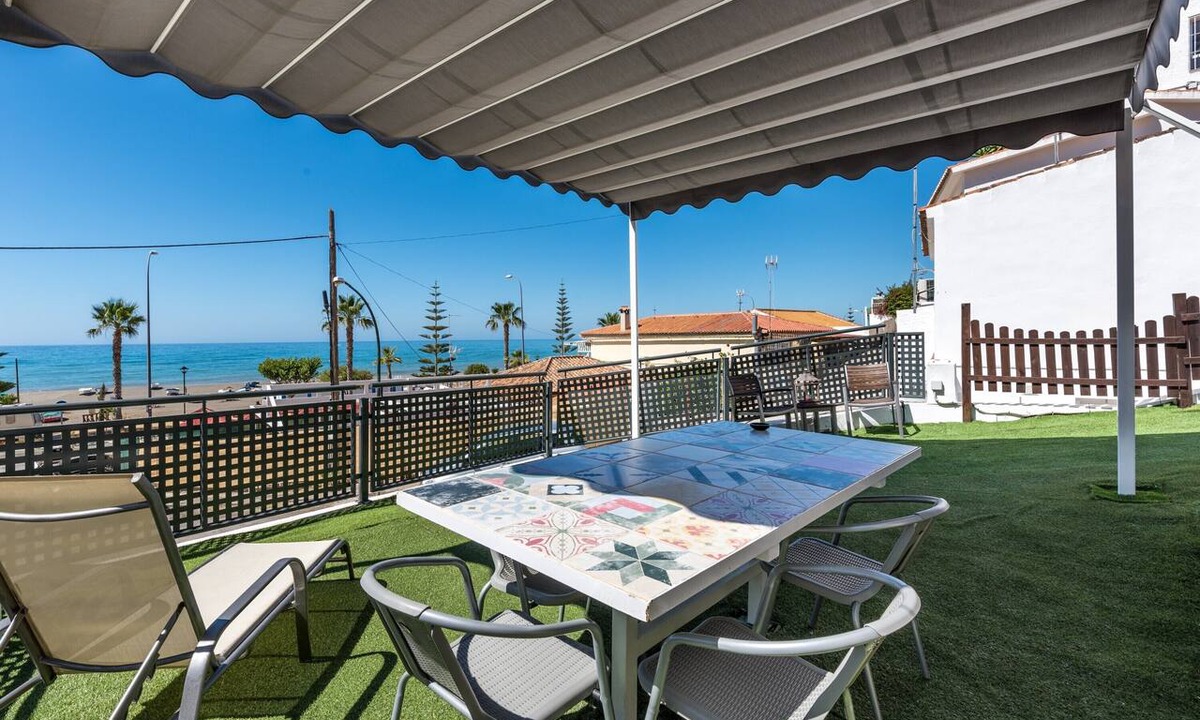 Benajarafe Apartment | Beachfront Apartment with Air Conditioning, Stunning Views, Terrace, and Wi-Fi