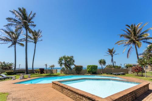 Ballito Apartment | Beachfront Apartment with Ocean Views, Pool & Direct Beach Access