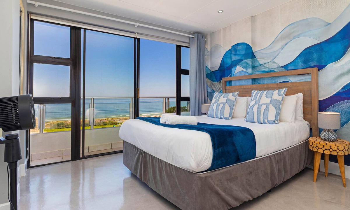 Flora Park Apartment | Beachfront Bliss with Pool & Ocean Views