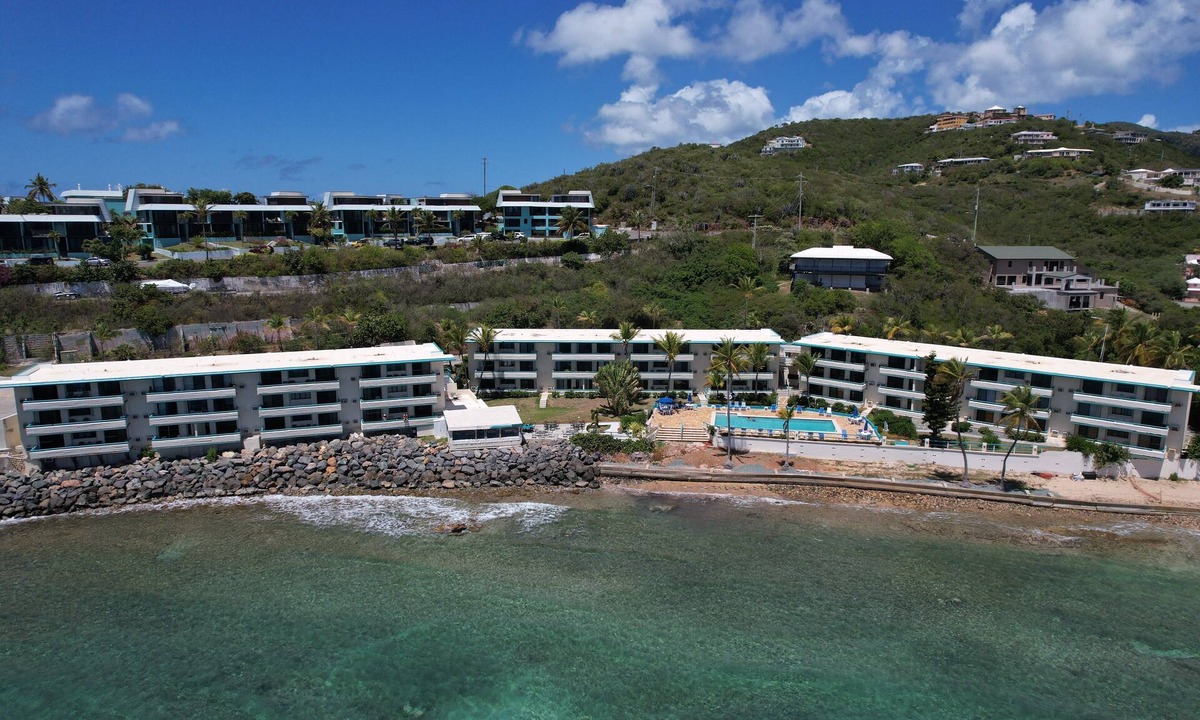 Estate Bolongo Apartment | Beachfront Condominium + bar/restaurant on-site: LeBlu