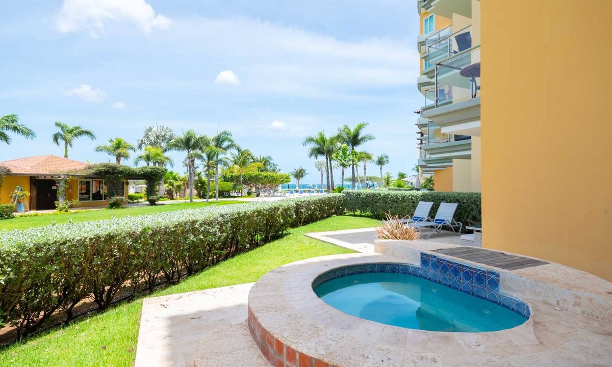 Oranjestad-West Condo | Beachfront - Garden Delight 3BR condo - E125