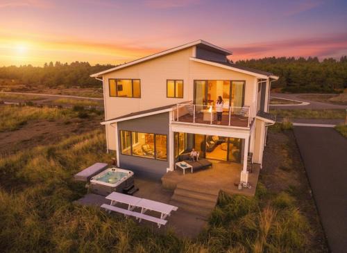 Cohassett Beach House | Beachfront Modern with Hot Tub, Game Room, Sleeps 14