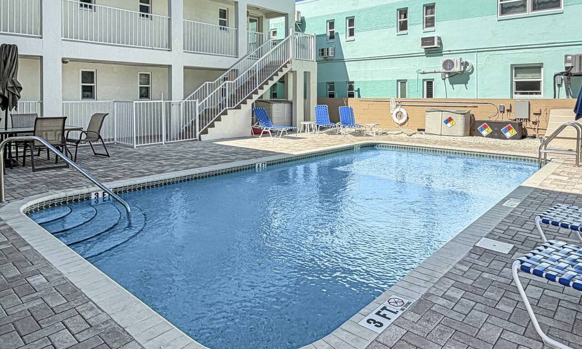 Pass-a-Grille Historic District Condo | Beachfront on Pass-A-Grille Beach with Pool! Walking Distance to Great Restaurants and Shops.