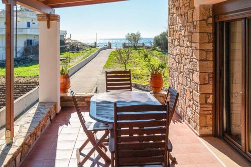 Ormos Koumeikon House | Beachfront Stone House - Samos Seaview Retreat