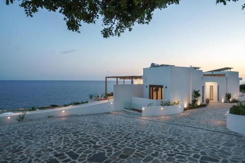 Goudhouros Villa | Beachfront Villa Atalandia with Heated Pools, Gym, BBQ & Office
