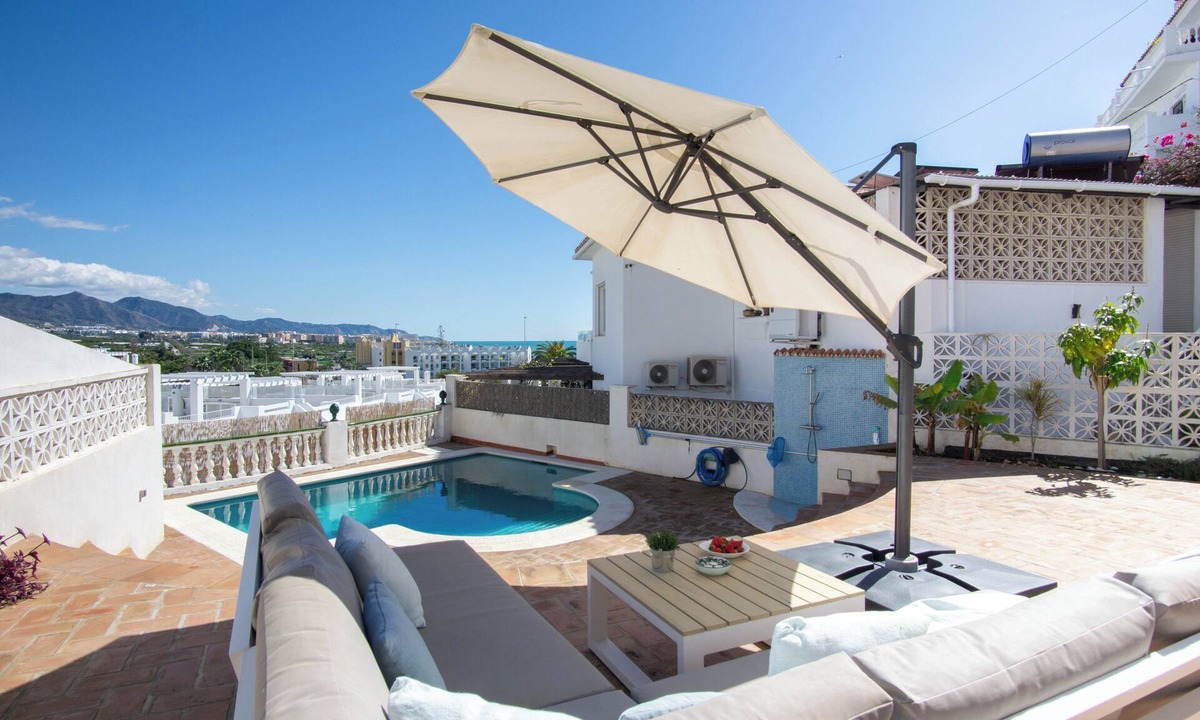 Punta Lara House | Beachfront villa for 6 in Nerja Punta Lara with private pool, sea and garden views. Mountain view