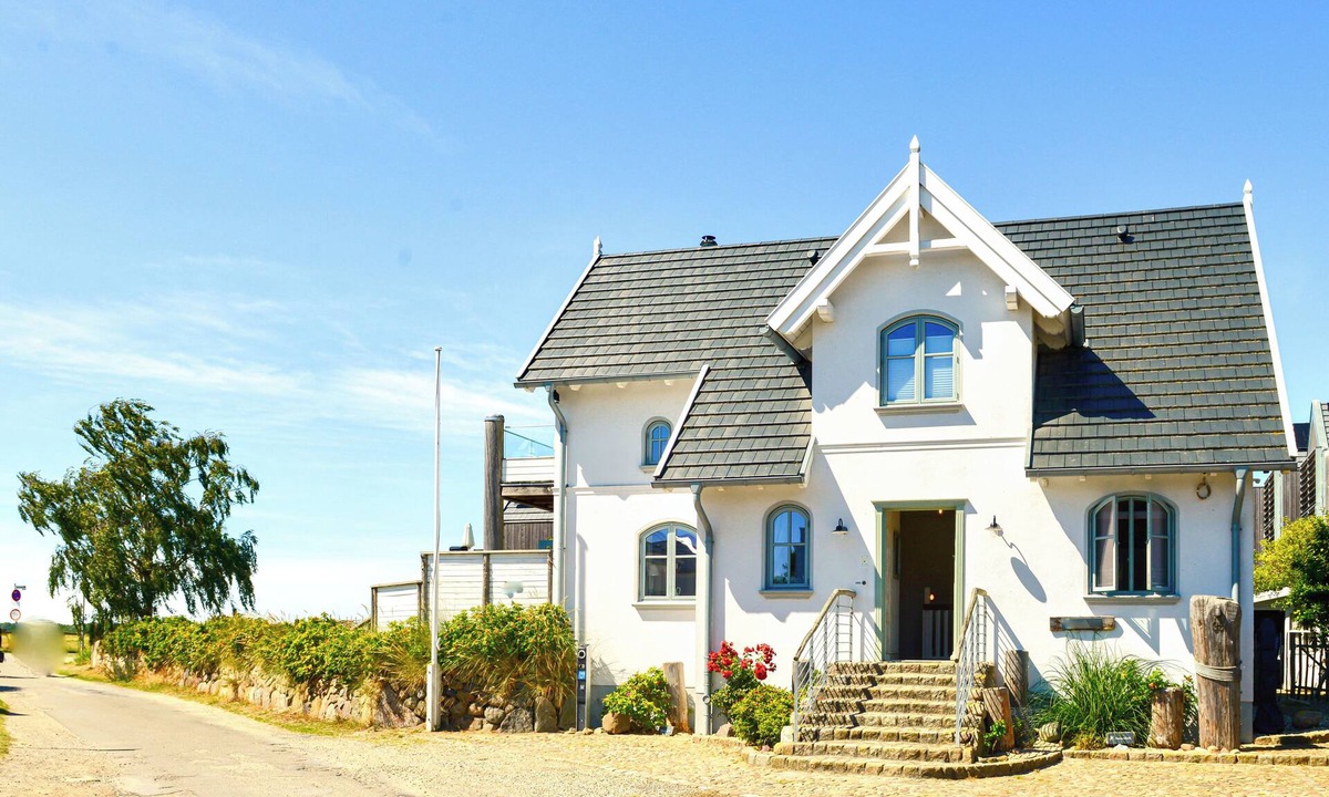 Fehmarnsund Apartment | BEACHHOUSE-FEHMARN I Apartment Ostwind I Sea view & directly on the beach I Fireplace