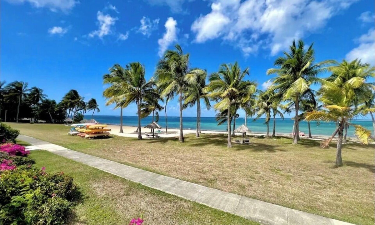 Estate Golden Rock Condo | Beachside Bliss: View paradise from your balcony! 2 Bedroom/2 Baths/2 Balconies!