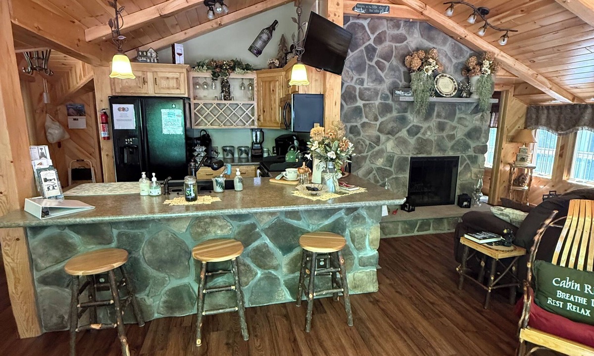 Dayton Cabin | Beautiful 2 BR cabin with a wall of windows overlooking the deck and stream.