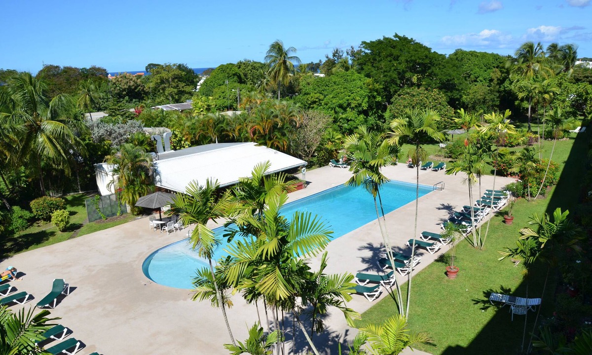 Sandy Lane Apartment | Beautiful 4th.floor condo with pool and spectacular sunsets and ocean view